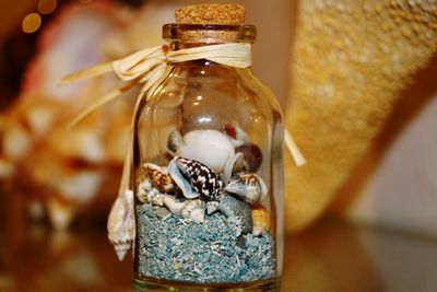 Close-up of bottle in jar