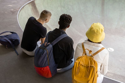 Young friends sitting together