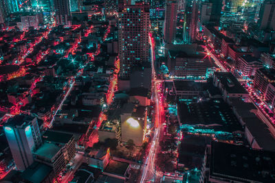 High angle view of illuminated cityscape at night