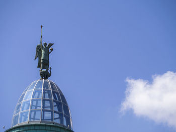 Statue of st. george on the glass dome of the building in downtown kyiv