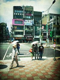 People walking on city street