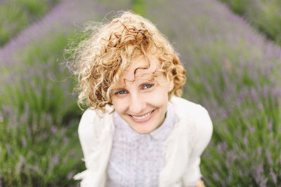 High angle view of young woman in field of lavender