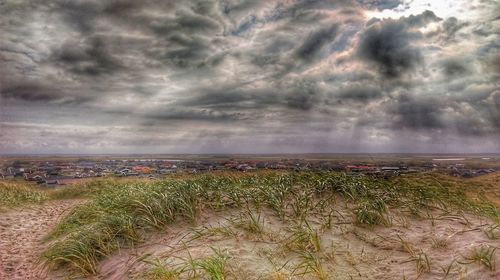 Scenic view of dramatic sky over sea