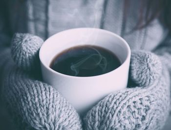 Close-up of coffee cup with ice cream