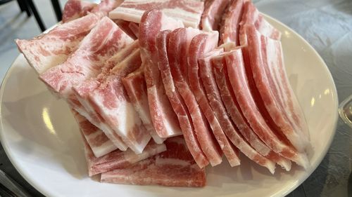 High angle view of meat in plate on table