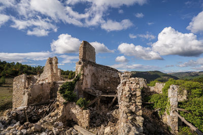 Castle against cloudy sky