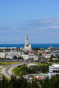 Buildings in city against sky