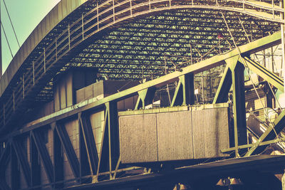 Low angle view of bridge in city