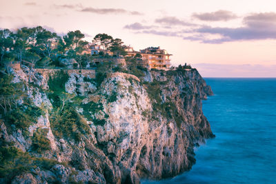 Scenic view of sea against cloudy sky