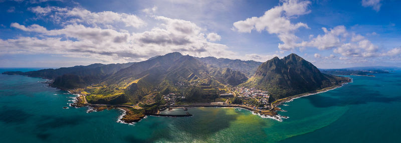 Panoramic view of sea against cloudy sky