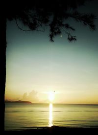 Scenic view of sea against sky at sunset