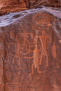 Close-up of text on rock