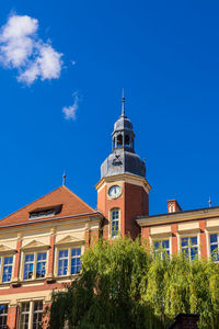 Low angle view of building against blue sky