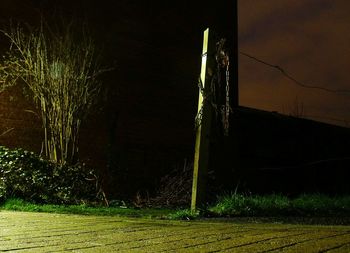 Windmill against sky at night