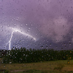 Close-up of wet window in rainy season