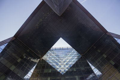 Low angle view of modern building against clear sky