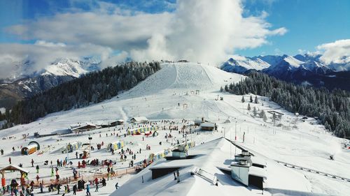 Group of people on snow covered landscape