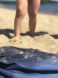 Low section of person on beach