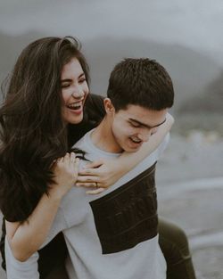 Young couple kissing outdoors