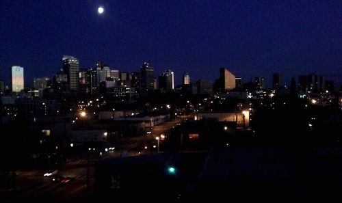 Illuminated cityscape at night