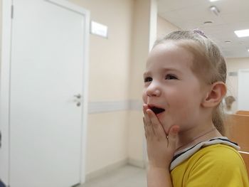 Waiting for an appointment at the clinic.  the child is waiting for an invitation to the doctor