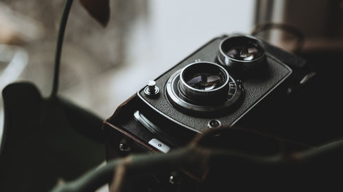 Close-up of camera on table