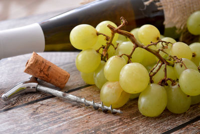 Close-up of grapes on table