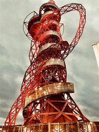 Low angle view of ferris wheel against sky