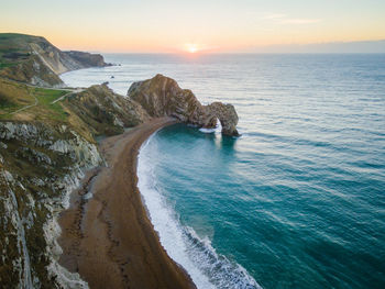 Scenic view of sea against sky during sunset