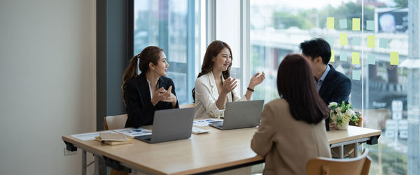 Business colleagues working at office