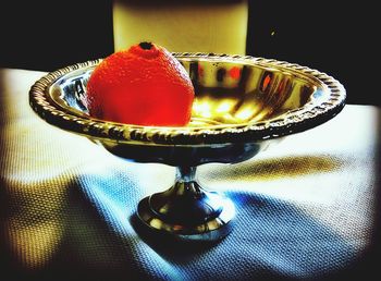 Close-up of red object on table