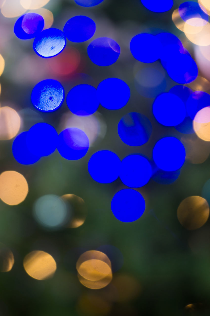 CLOSE-UP OF ILLUMINATED LIGHTS