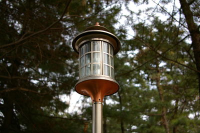 Low angle view of street light against sky