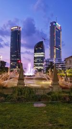 Buildings in city against sky