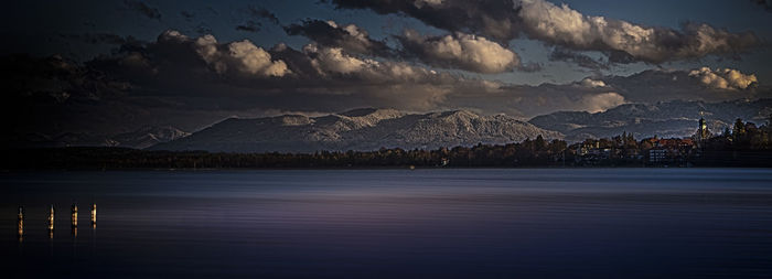 Scenic view of sea against sky at night