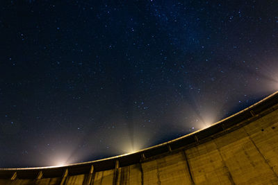 Low angle view of stars against sky at night