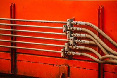 Close-up of pipes against wall