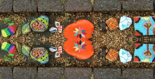 Directly above shot of multi colored candies on wall