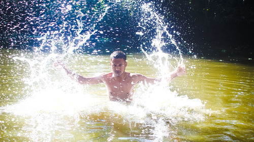 Man swimming in pool