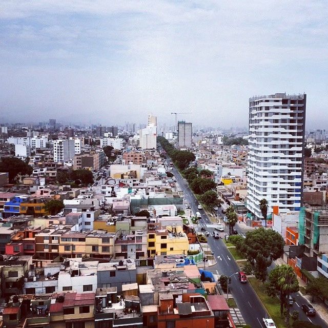 building exterior, architecture, city, built structure, cityscape, crowded, high angle view, residential district, residential building, sky, residential structure, skyscraper, city life, tall - high, tower, day, office building, outdoors, building, no people