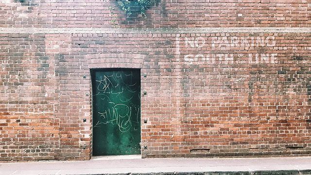 architecture, built structure, brick wall, building exterior, wall - building feature, closed, wall, door, window, house, stone wall, entrance, red, outdoors, brick, day, no people, old, weathered, safety