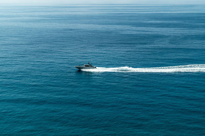 Boat sailing in sea