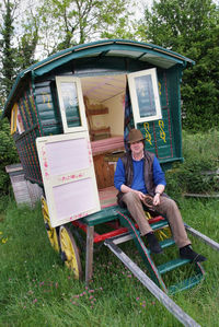 Portrait of man sitting on grass