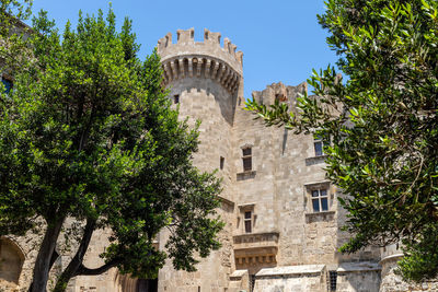 Low angle view of historical building against sky