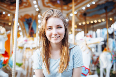 Portrait of young woman at amusement park