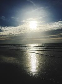 Scenic view of sea against sky at sunset