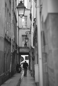 People walking in alley