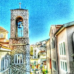 Low angle view of church against blue sky