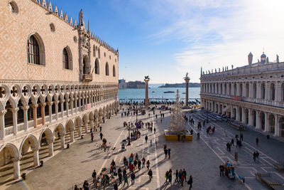 Group of people in front of historical building