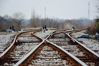 Surface level of railroad tracks against clear sky